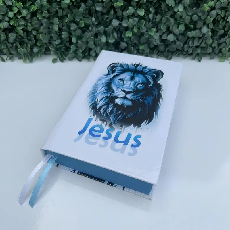 Bíblia ARC Jesus Azul deitada mostrando capa e acabamento